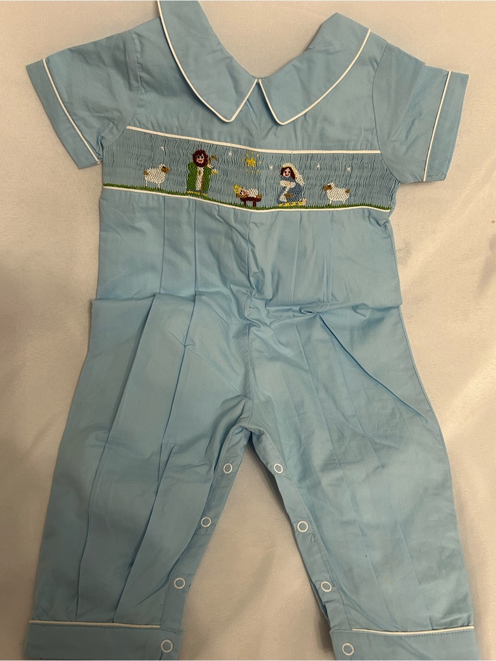 Light Blue Smocked One-Piece Bodysuit with Embroidered Scene